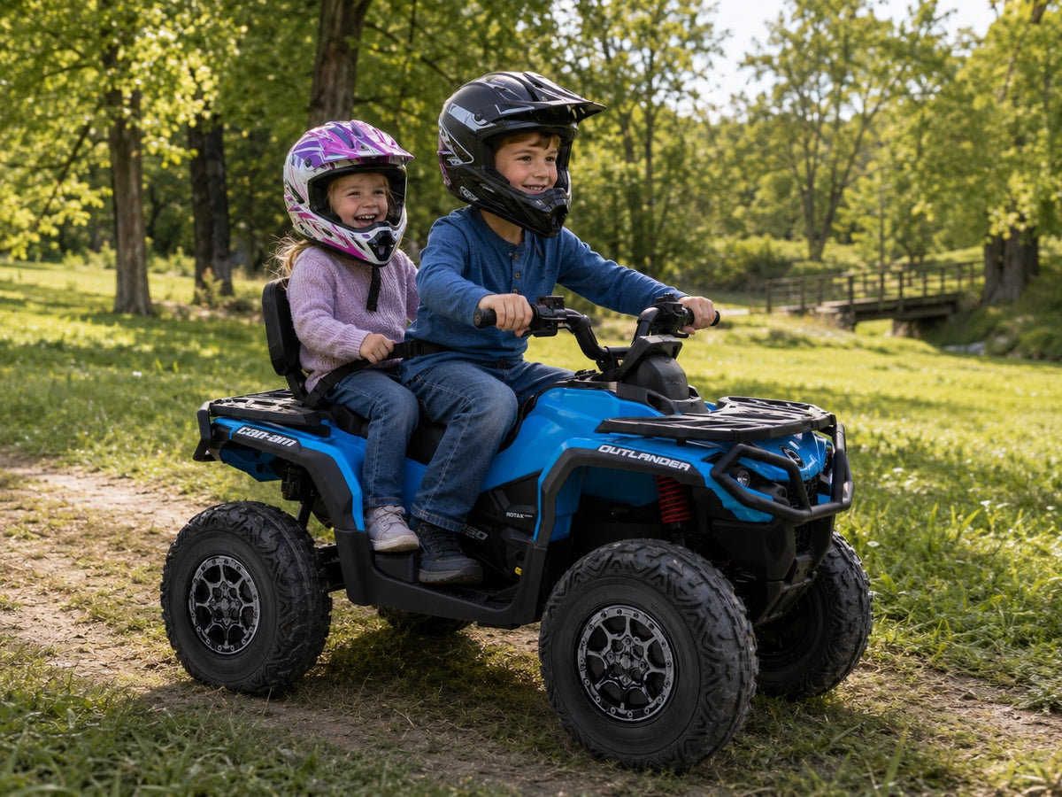2 seater Can-Am kids ATV with an 8 year old driving and younger sibling riding along